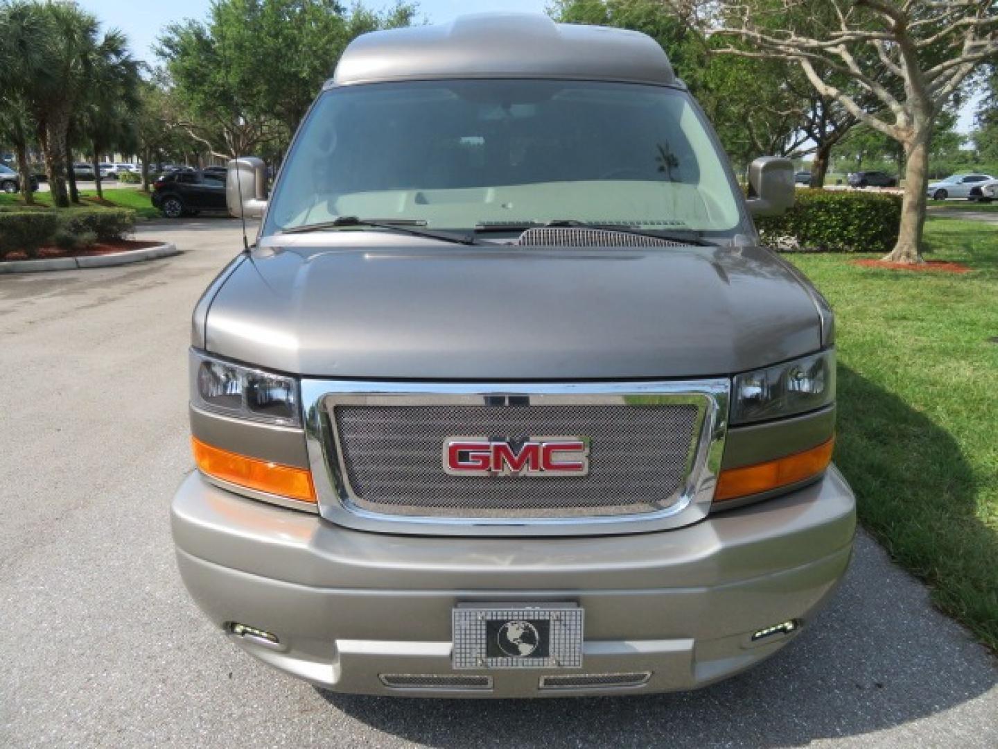 2013 /Beige Two Tone GMC Savana RV G1500 3LT (1GDS7DC45D1) with an 5.3L V8 OHV 16V engine, 4-Speed Automatic transmission, located at 4301 Oak Circle #19, Boca Raton, FL, 33431, (954) 561-2499, 26.388861, -80.084038 - You are looking at a Gorgeous 2013 GMC Savana 1500 High Top Conversion Van Explorer Limited SE Package Handicap Wheelchair Conversion Van with 72K Original Miles, Side Entry Braun Millennium Series Wheelchair Lift, Rubber Floor, Q-Straint Tie Down System, Navigation, Back Up Camera, Huge flat Screen - Photo#19